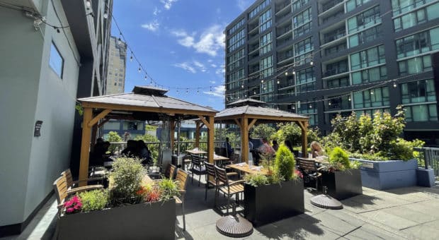 Picture of a welcoming outdoor patio on a beautiful summer day