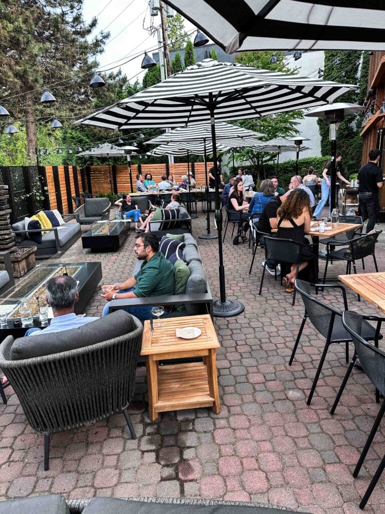 Patio with guests at Von's 1000Spirits in Woodinville, Washington