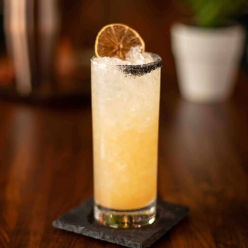 Tequila cocktail with grapefruit, soda, and house-made hot honey, served spicy, sweet, and refreshingly bold.
